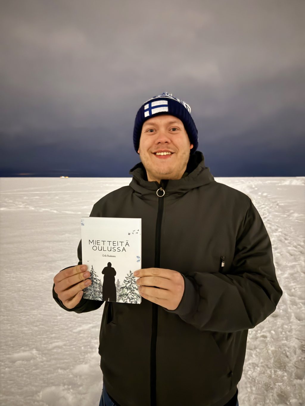 Man holding a book on ice