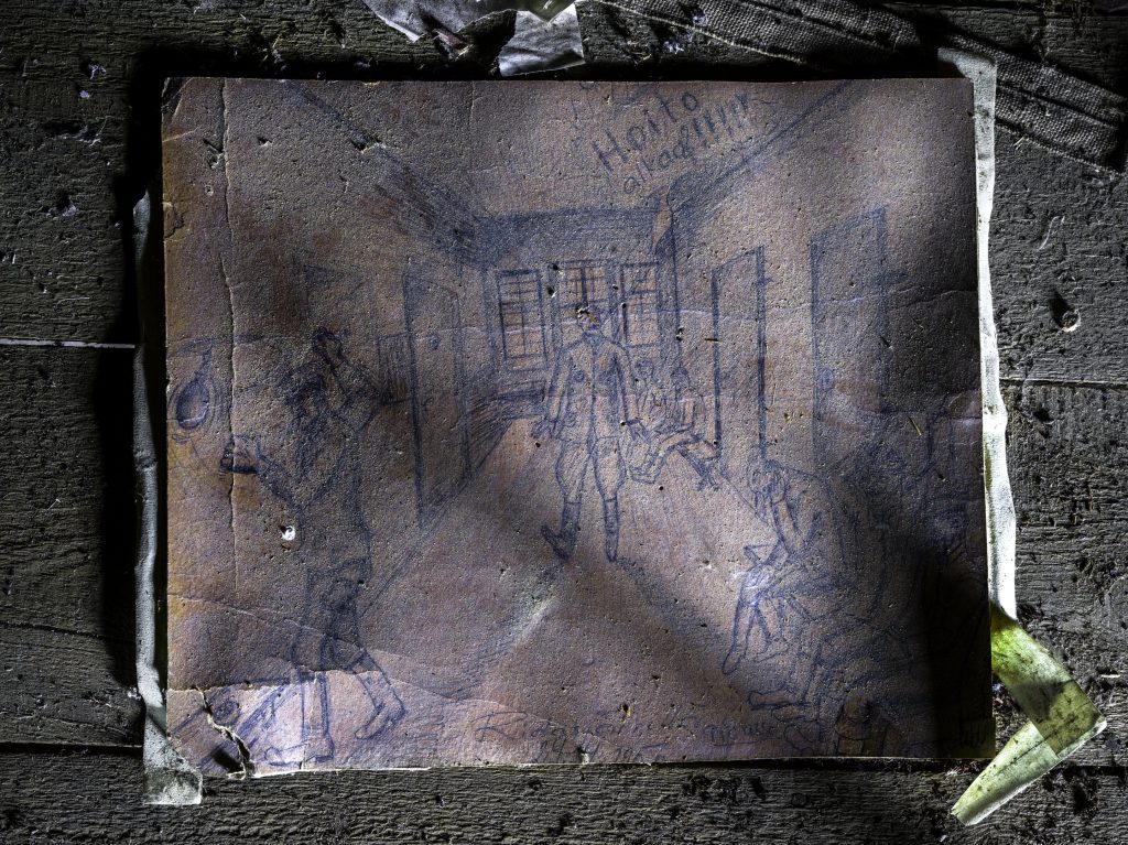 Vanha piirros hoitolaitoksen käytävästä.